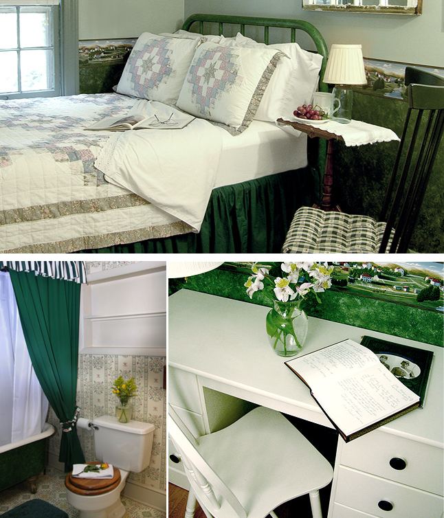 Sallie Room: green iron bed with a table and chairs, green tub bathroom, white desk with wildflowers and an open book, a painted portrait of Sallie the dog on the wall